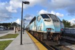 Northbound Tri-Rail train about to head away from Hialeah Market Sta 